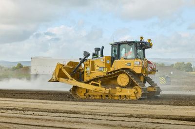 Caterpillar D6 dozer featuring Cat® Grade with 3D and the Trimble® Earthworks Grade Control Platform
