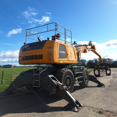 A Liebherr LH50 log handler parked on the SER hardstand.