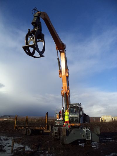 Liebherr LH50M material handler with 2.5m3 grab attachment