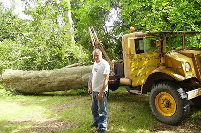 Founder Peter Stevens in the mid-2000s in front of a modified gun tractor dating back to WWII