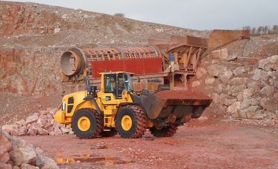 A Stevens Equipment Rental Volvo L180G wheeled loading shovel at work in a quarry